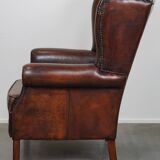 Large Sheepskin Leather Wingback Armchair with a Fixed Seat Cushion and a Stunning Patina