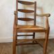 Cherry and straw armchair