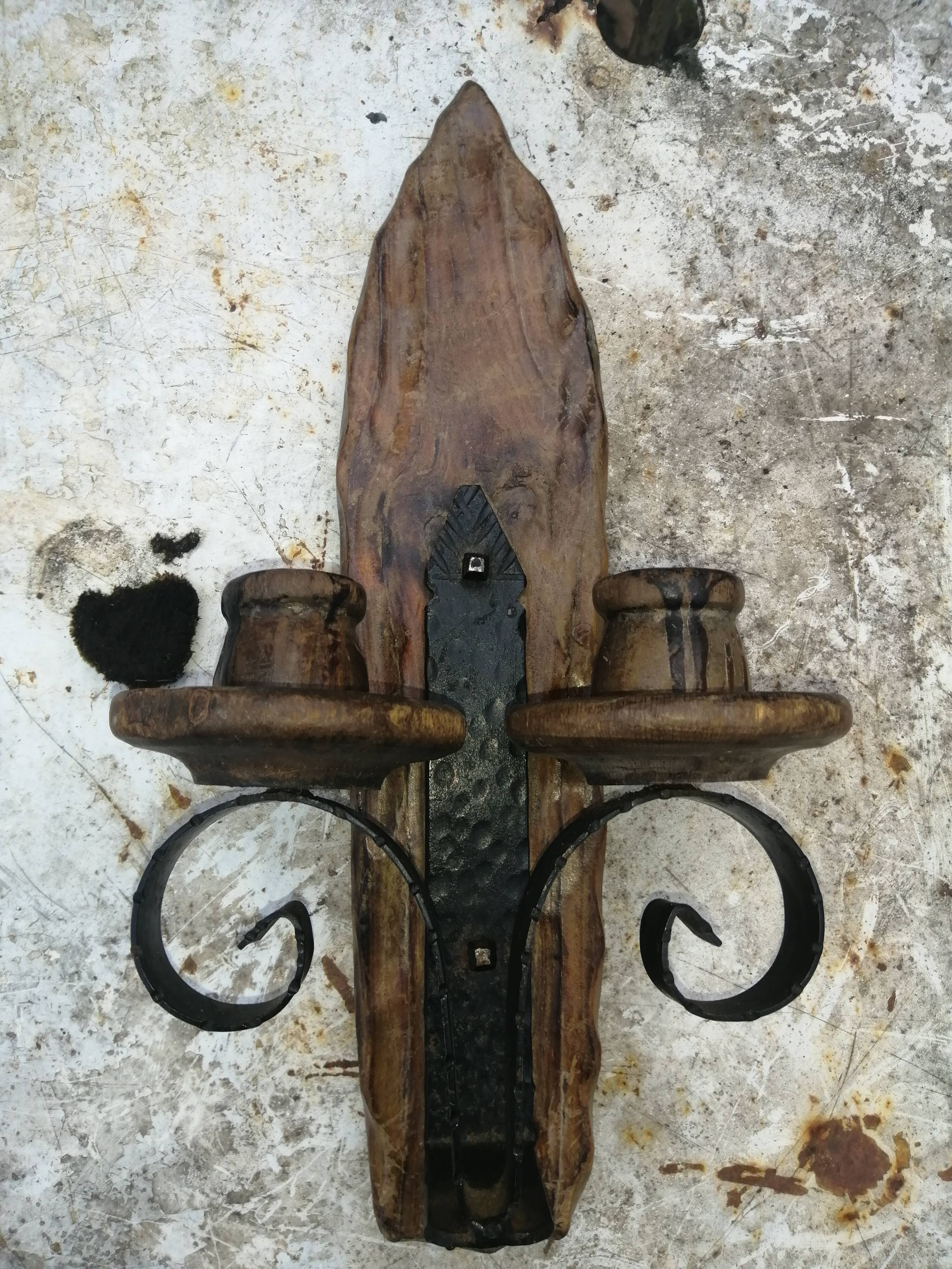 Rustic wooden wall lamp.