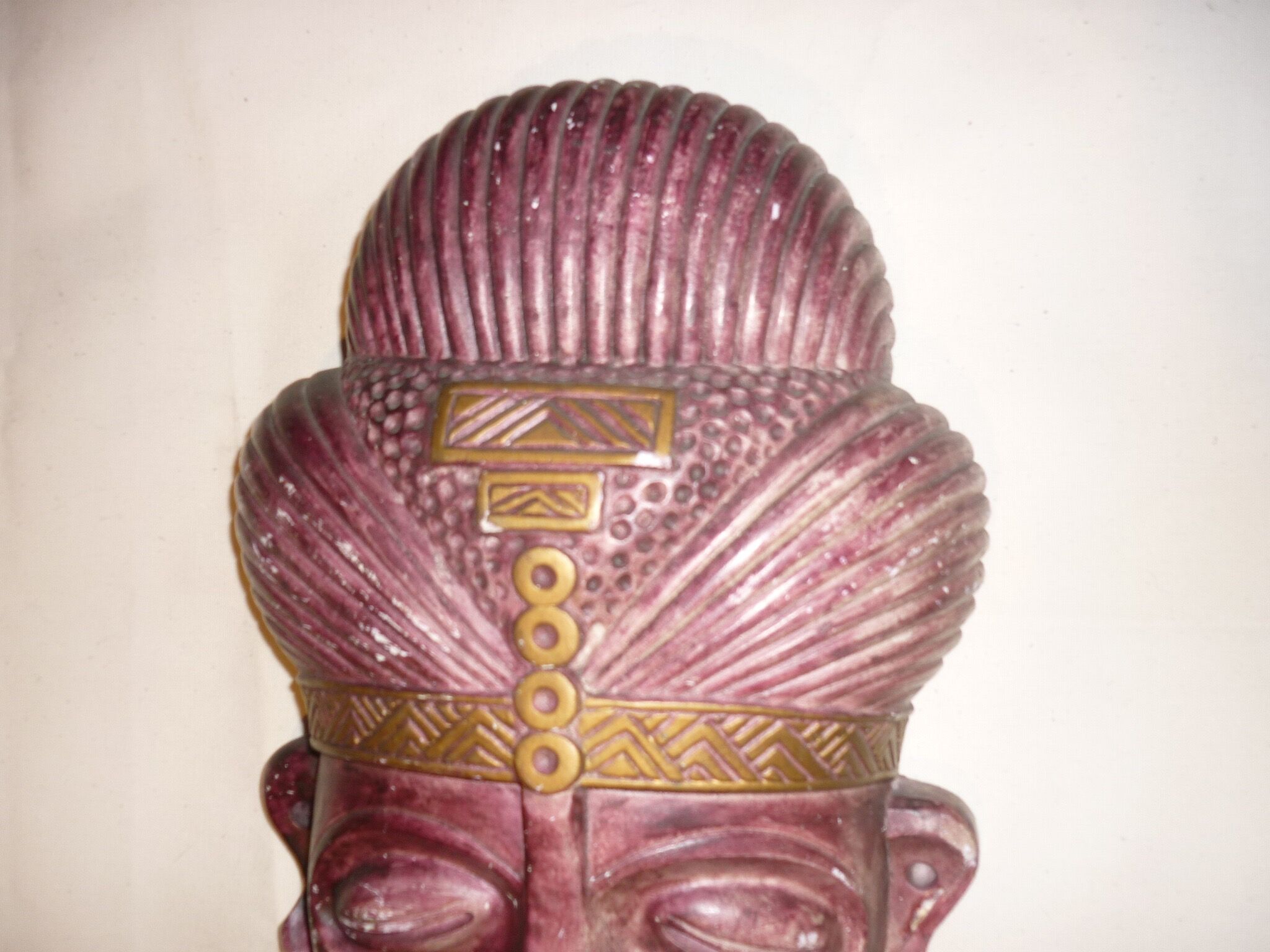 African mask in earth