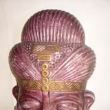 African mask in earth