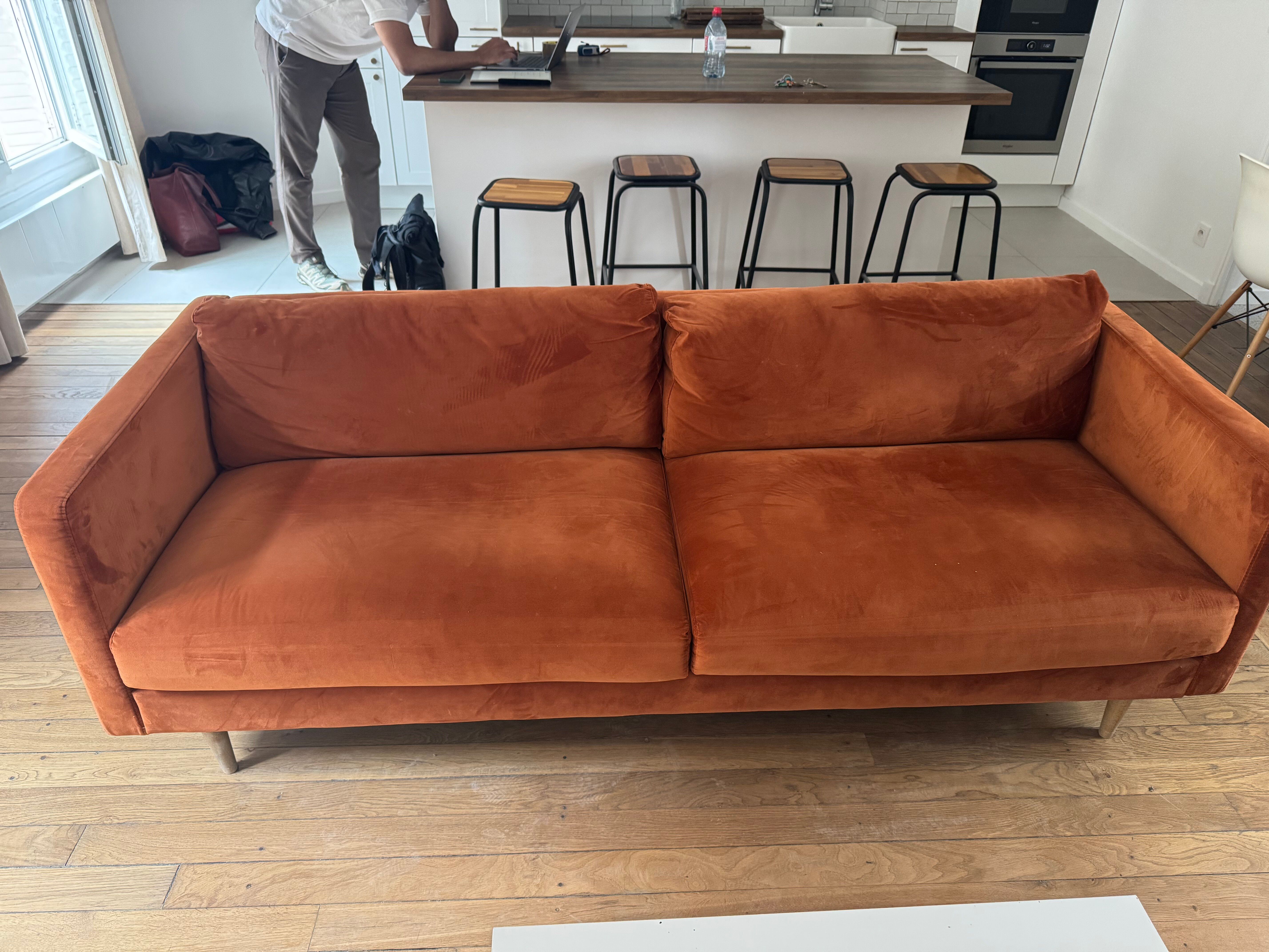 Orange velvet sofa