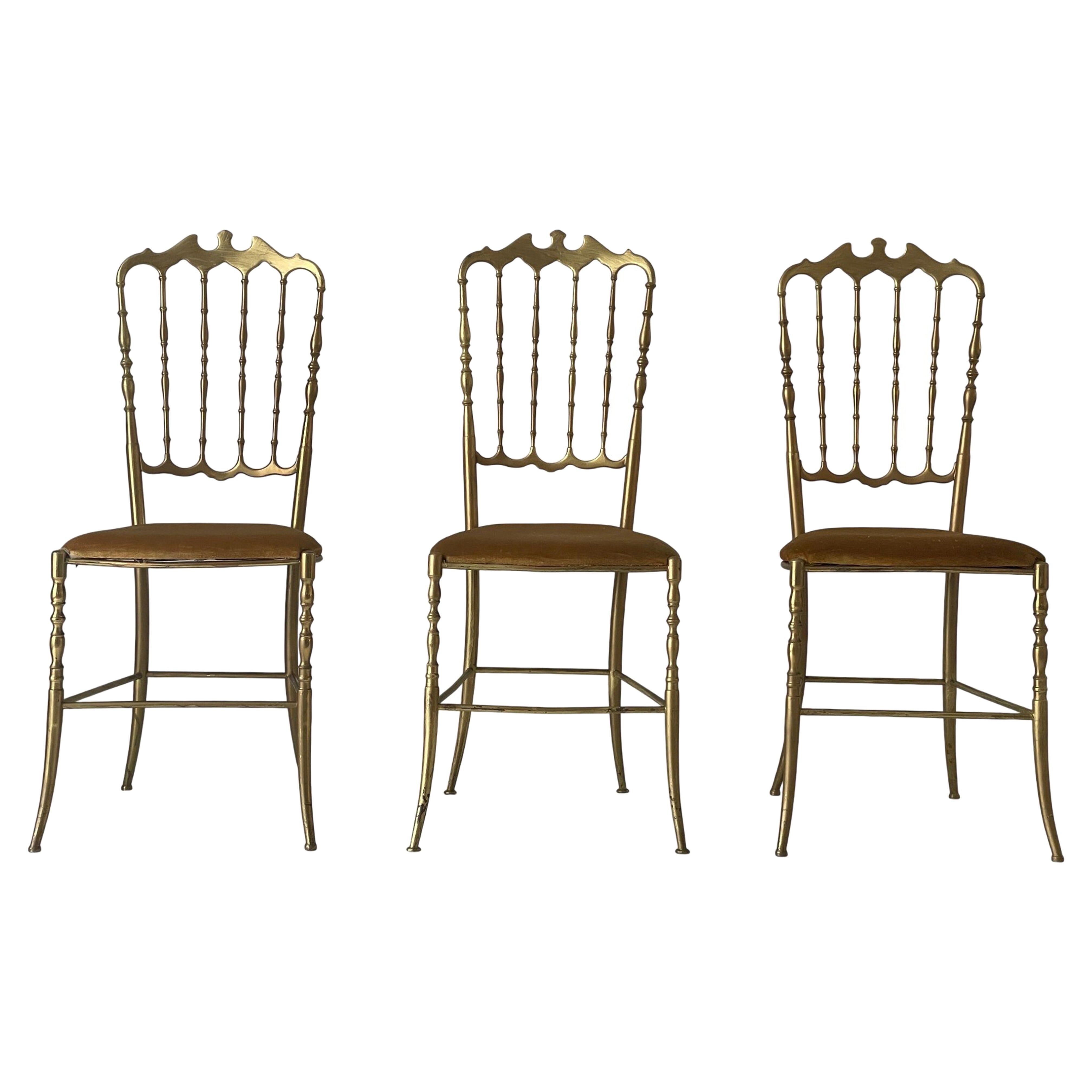 Set of 3 Chiavari chairs in brass with velvet seat and high back, 1950s, Italy.