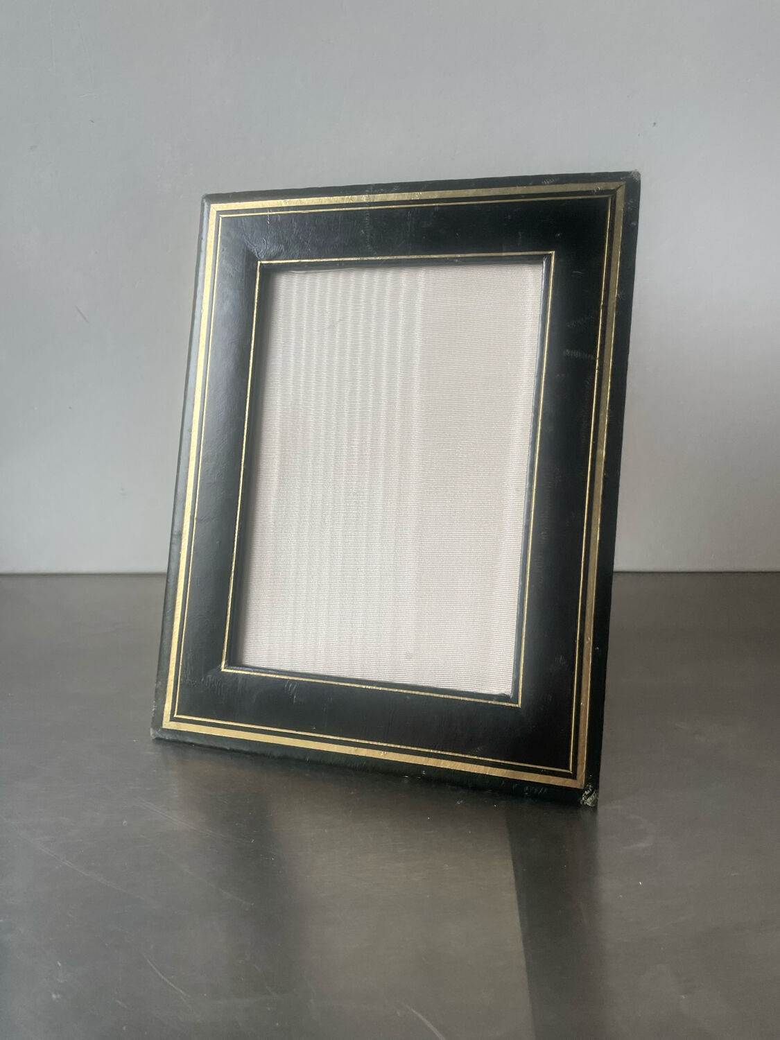 Antique black leather  with gilding frame measurements 19 cm x 15 cm