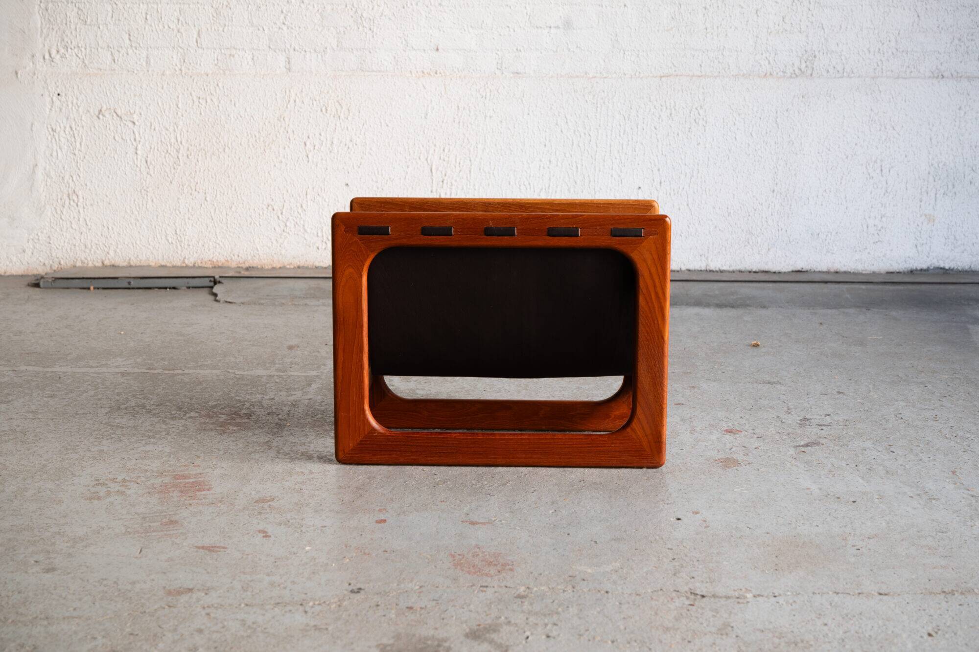 Magazine rack by Salin Mobler