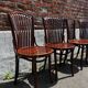 Lot of 4 vintage bistro chairs with slats in Thonet style.