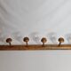 Portemanteau mural 1900 en bois tourné à l'imitation du bambou, 6 patères, 86 cm