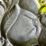 Old enameled cast iron trivet