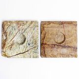 Pair of brutalist travertine candle holders