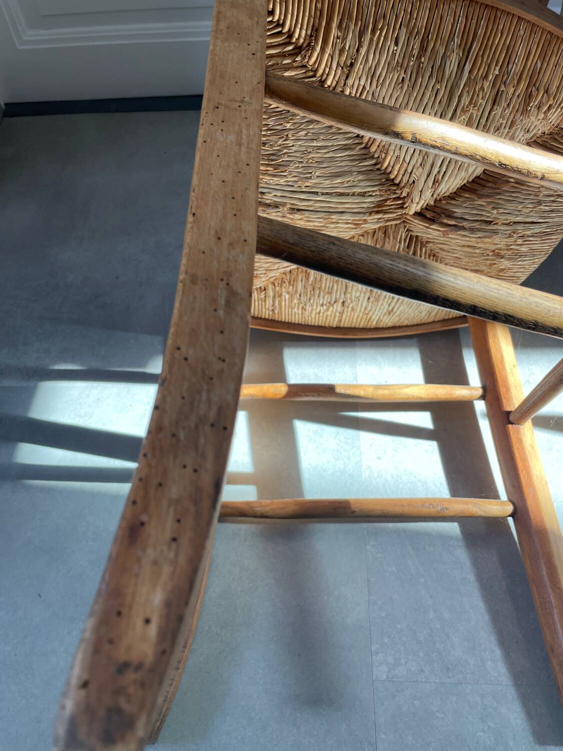 Straw and wood farm chair