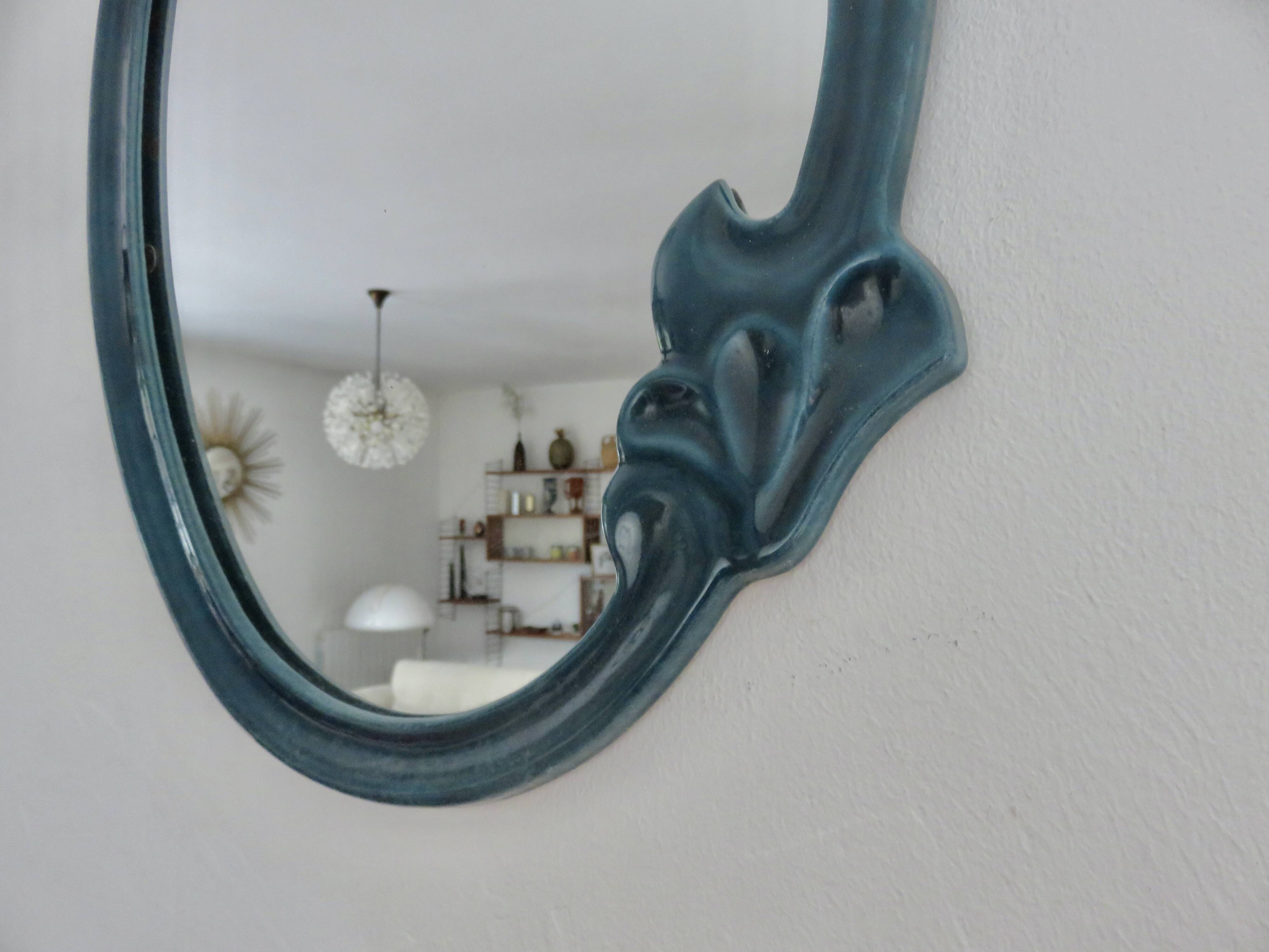 Art Nouveau mirror in blue enamelled cast iron in the style of Hector Guimard.