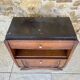 Art Deco bedside table in walnut, black marble top, circa 1920.