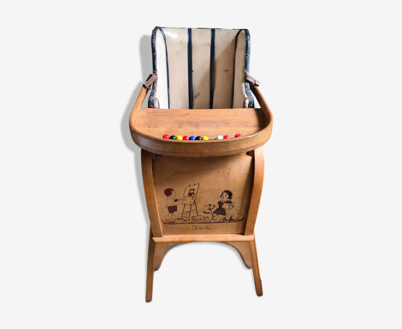 Old wooden high chair with leather seat and small built-in pot | Selency