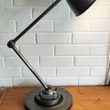 Old industrial two-arm workshop lamp