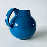 Old pitcher in glazed stoneware