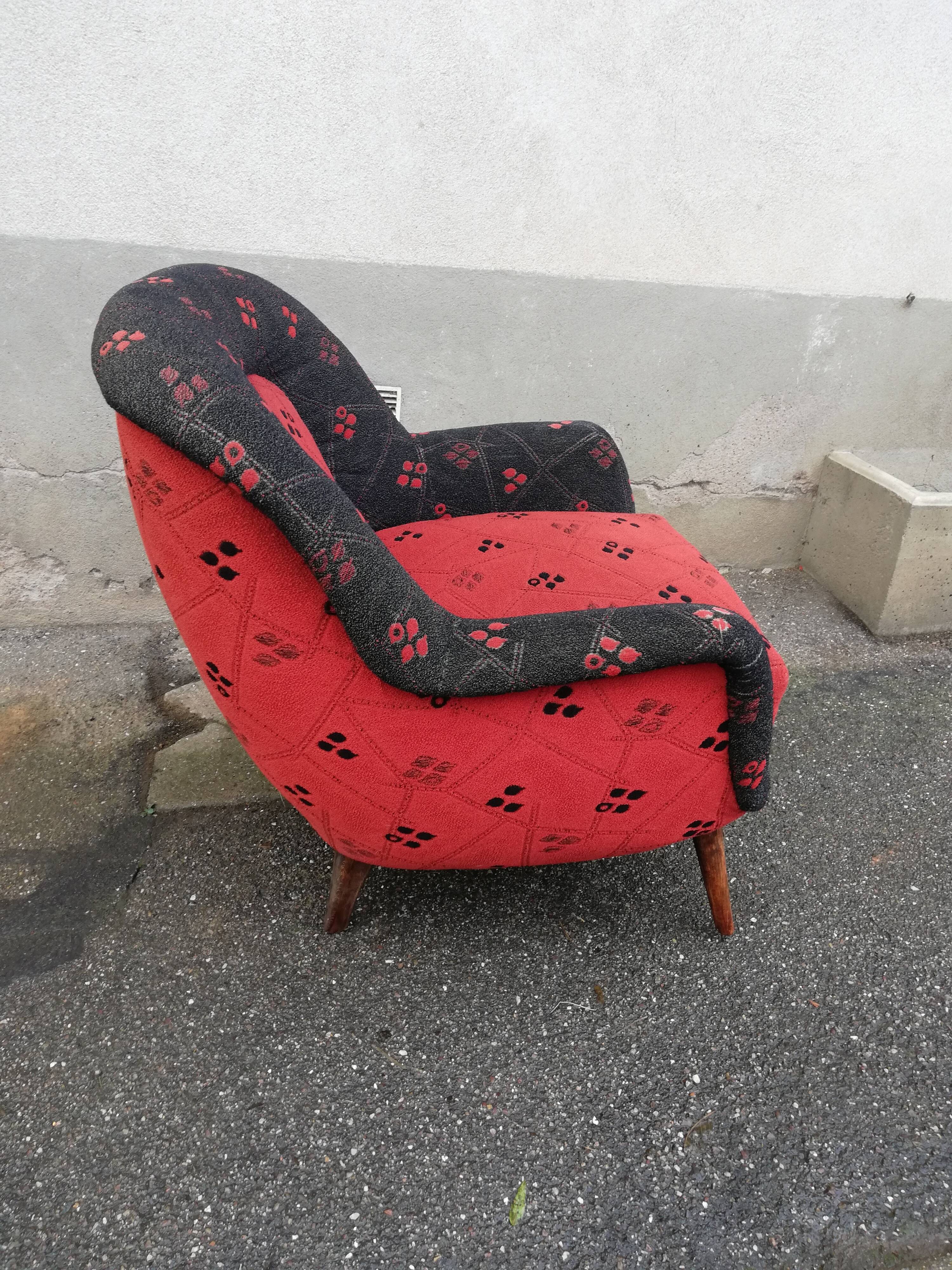 Fauteuil année 50 rouge et noir pieds compas
