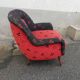 Fauteuil année 50 rouge et noir pieds compas