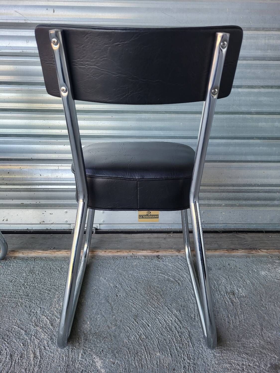 Pair of vintage black and chrome leatherette office chairs in very good condition
