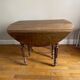 Round walnut table