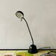Massive vintage desk lamp in black metal