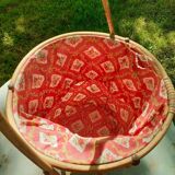 Red sewing cart of the 60s in wicker