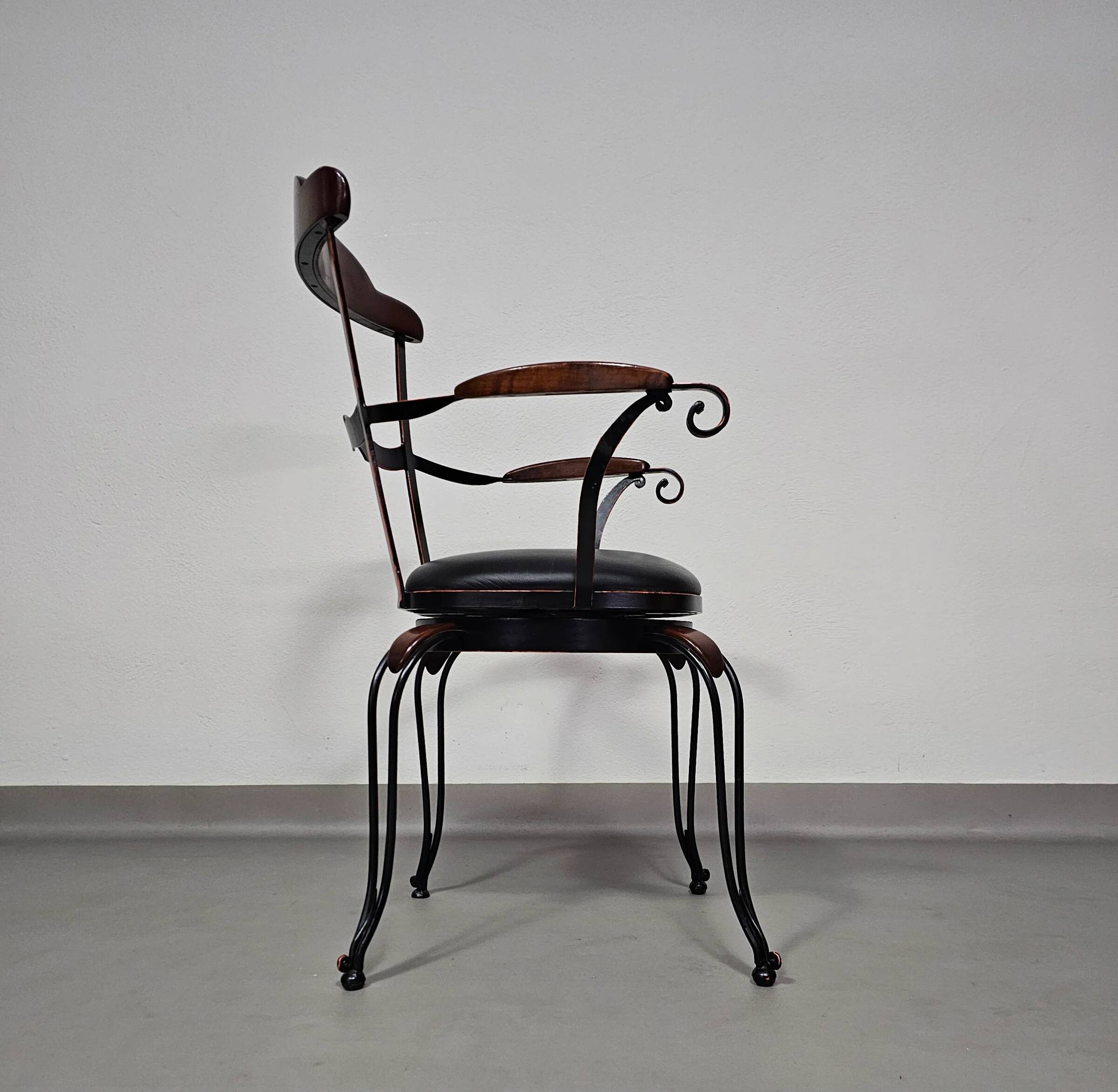 Italian postmodern turnable wrought iron dining chairs with leather seats