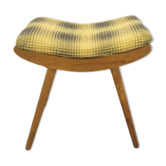 Vintage footrest with checkered cushion