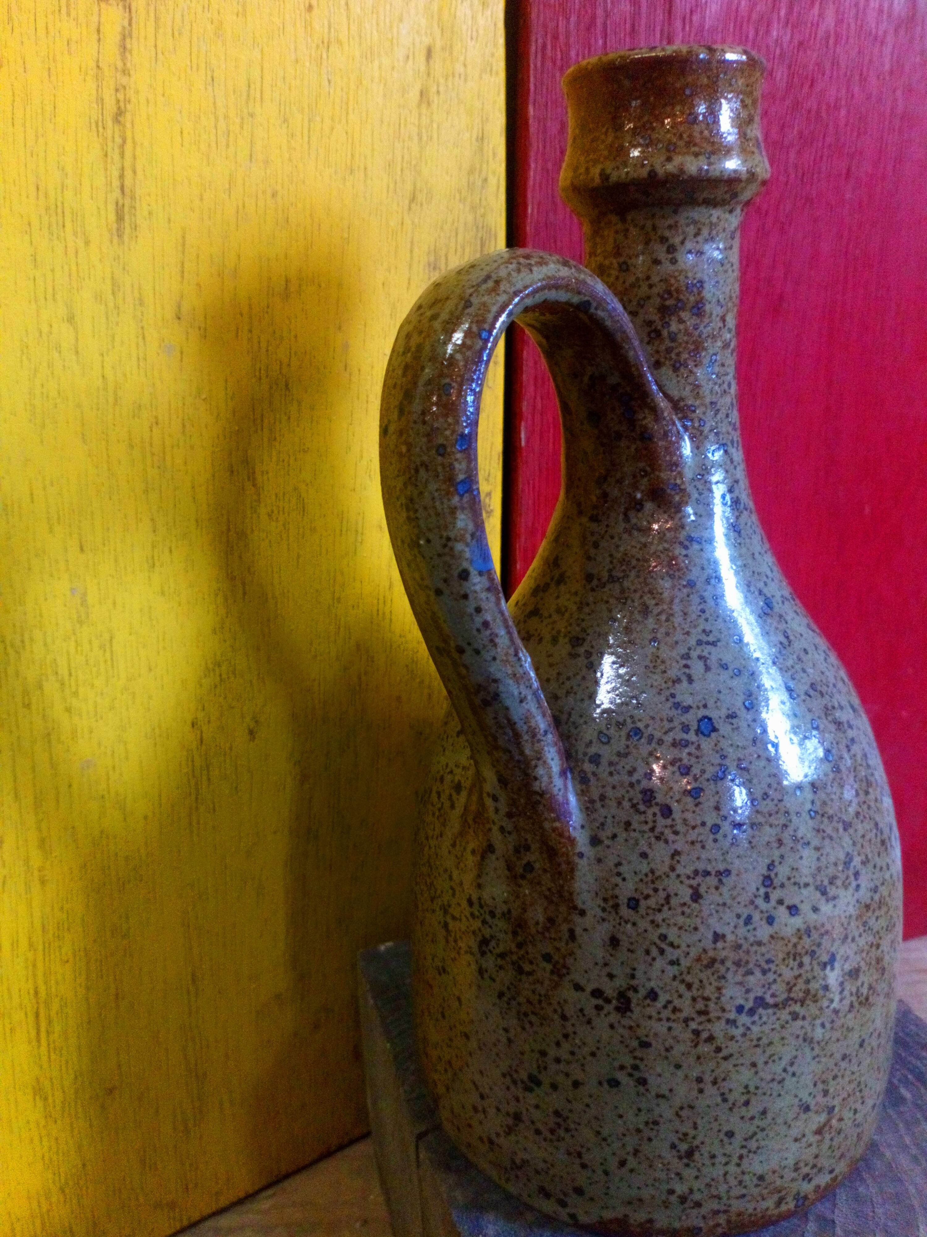 Vintage pottery in sandstone with handles and small beak