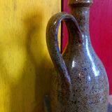 Vintage pottery in sandstone with handles and small beak