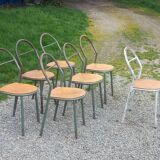 Set de 7 chaises de René Herbst métalliques assises bois