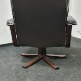 Vintage leather reclining swivel chair
