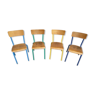 4 colored vintage school chairs