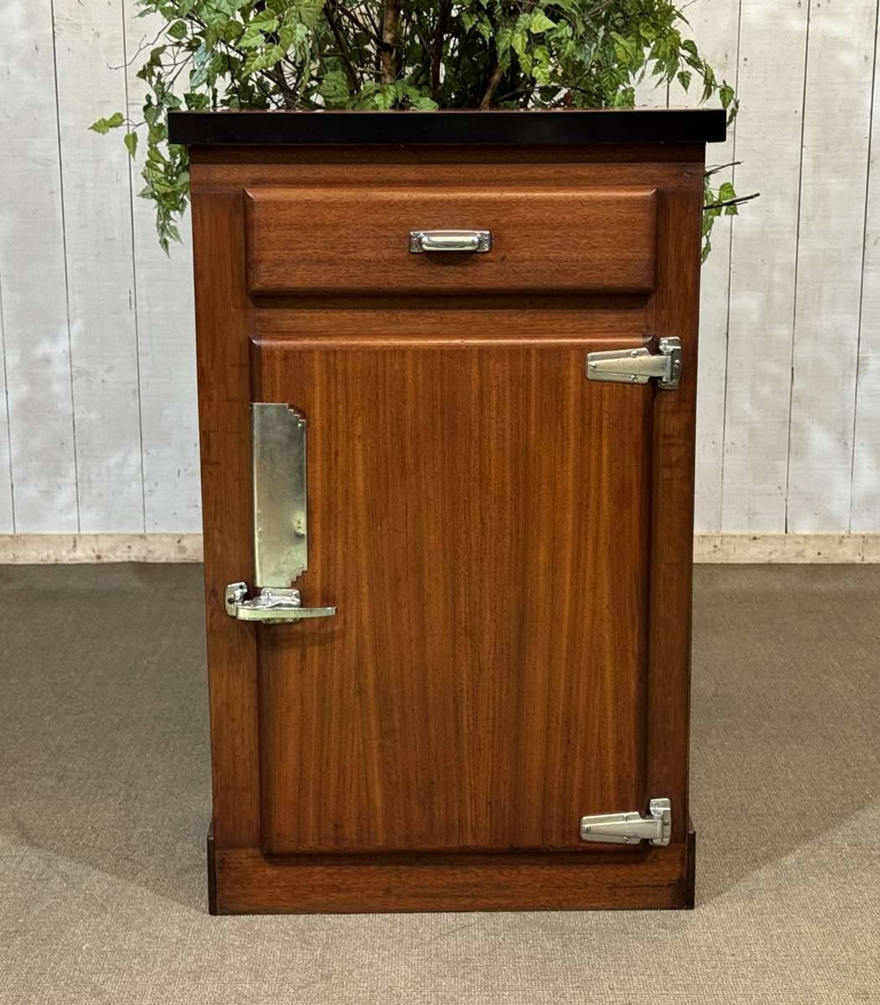 Bistro sideboard with 1 mahogany door and Formica top from the 1950s.