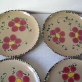 Set of 4 old large glazed ceramic flat plates with flower decor