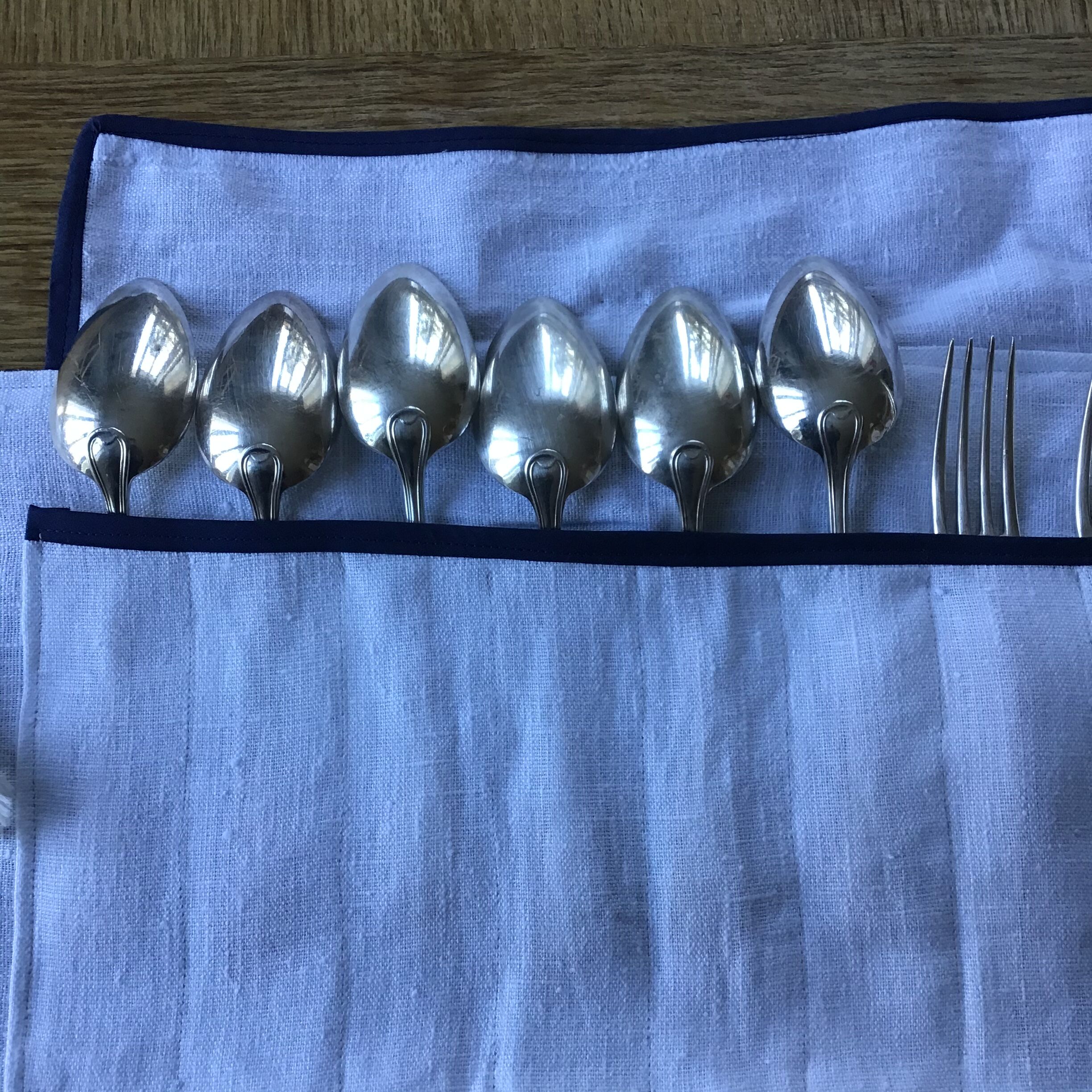 Set of 12 silver metal in their wallet