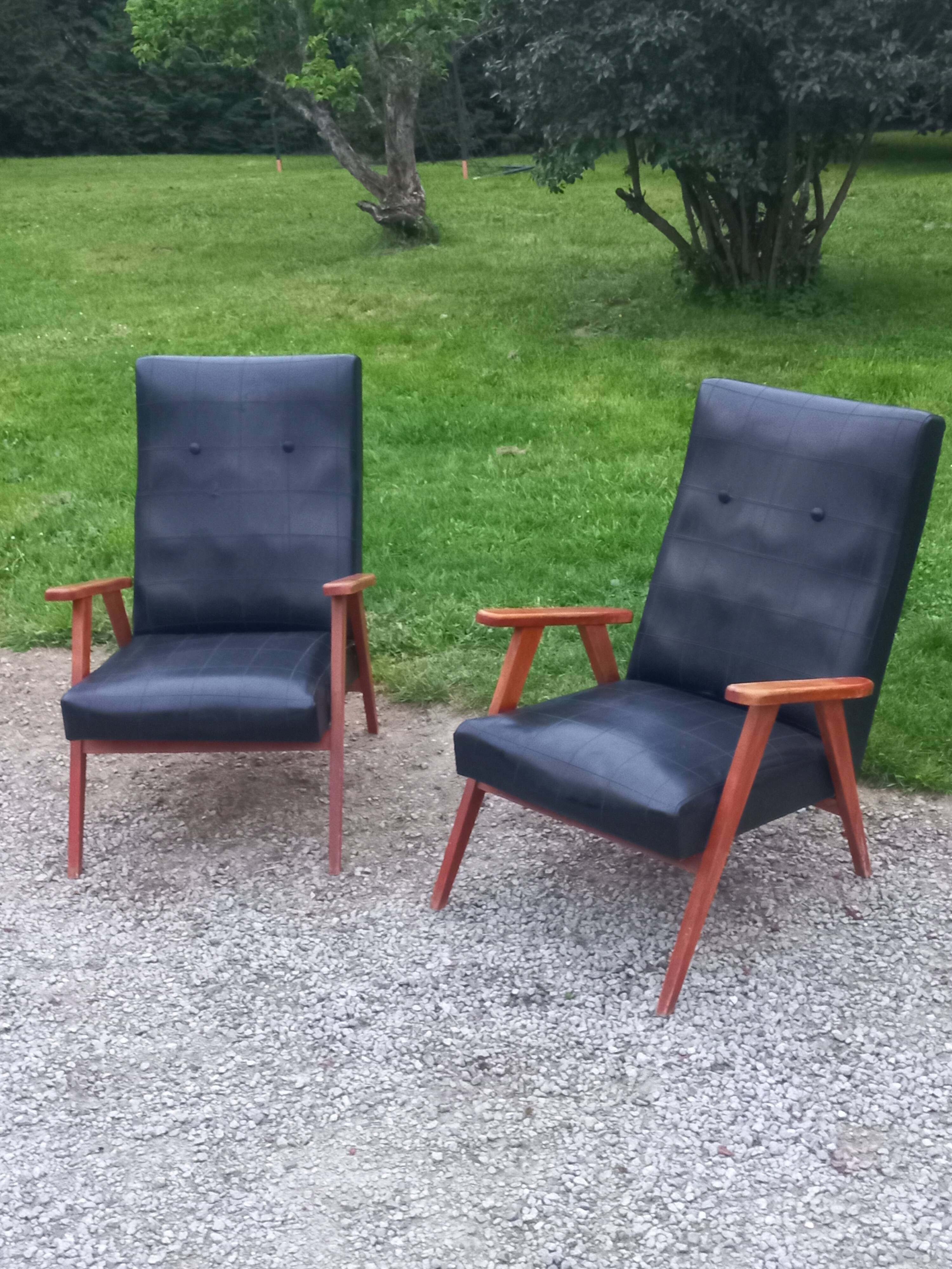 Pair of vintage beech armchairs feet compass covered with black moleskine from the 50s
