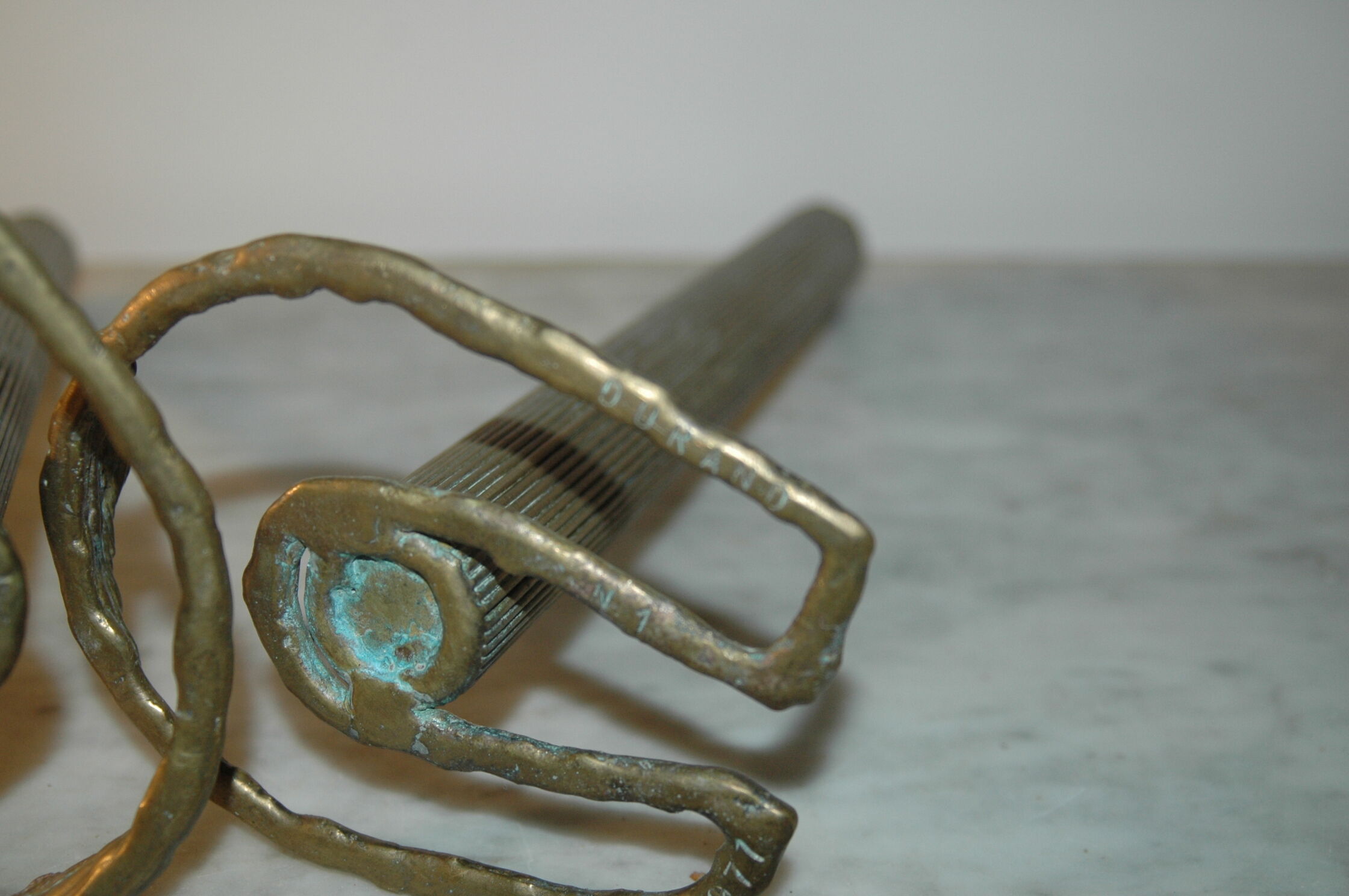 2 horseshoe candlesticks in solid brass  signed Durand