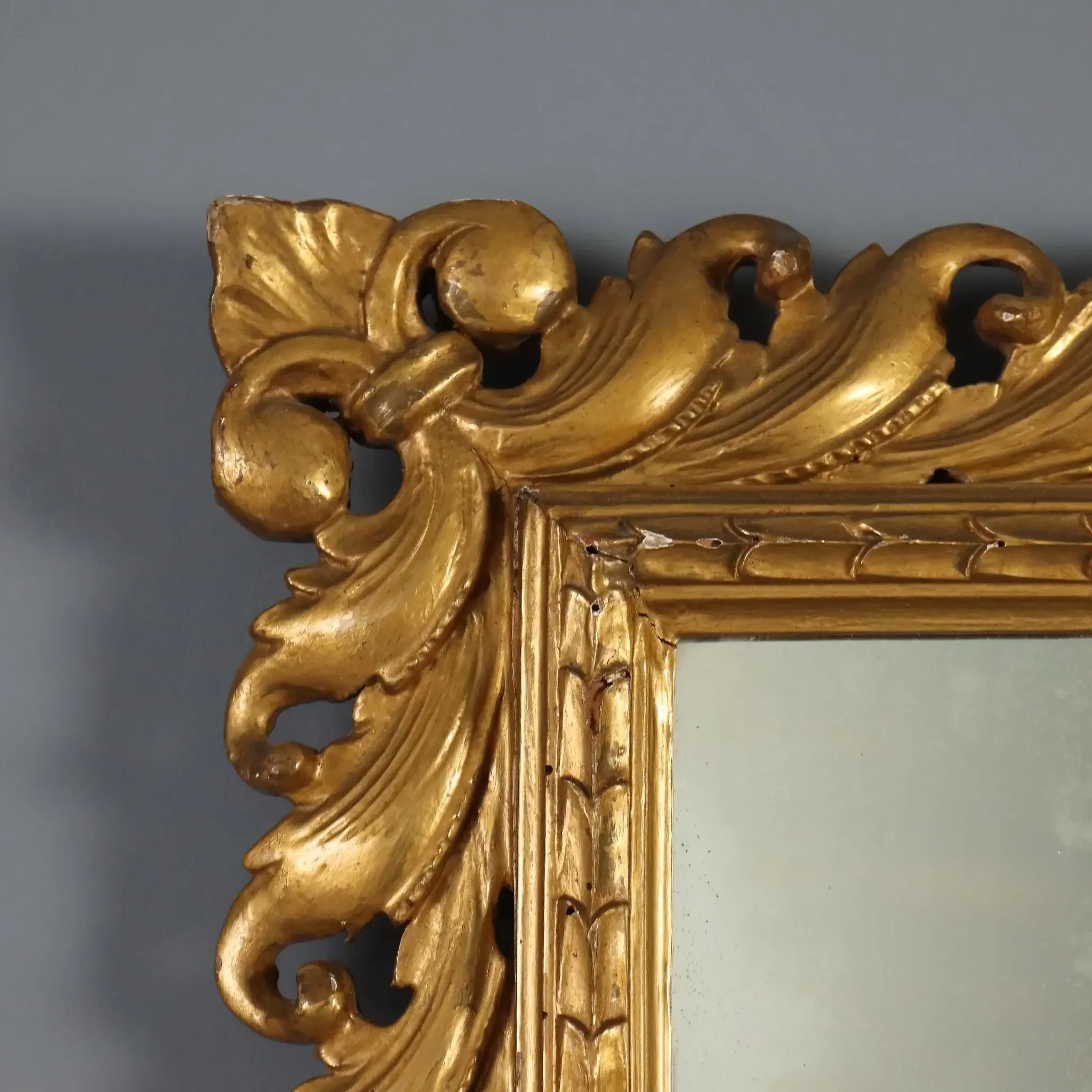 Eclectic antique mirror in carved and gilded wood, Italy, 20th century