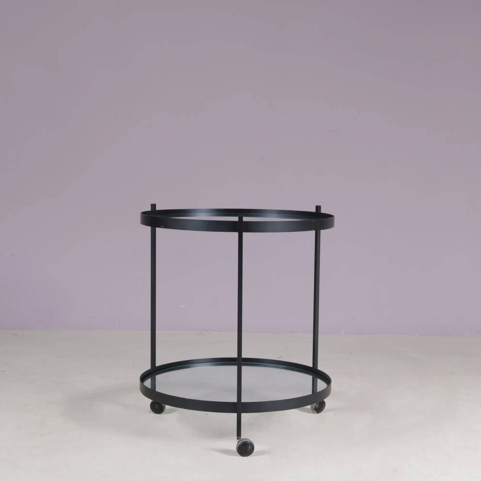 1960s round trolley black metal with two glass tops Janni van Pelt Netherlands