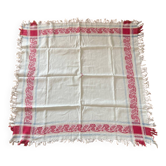 Old cotton tablecloth with flowers and fringes
