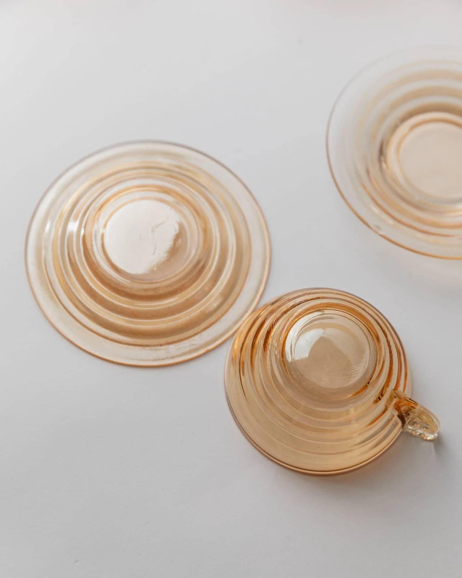 Vintage 1950s glass coffee cups, set of 5, iridescent peach ribbed glass with saucers, Italian design Gondolo.