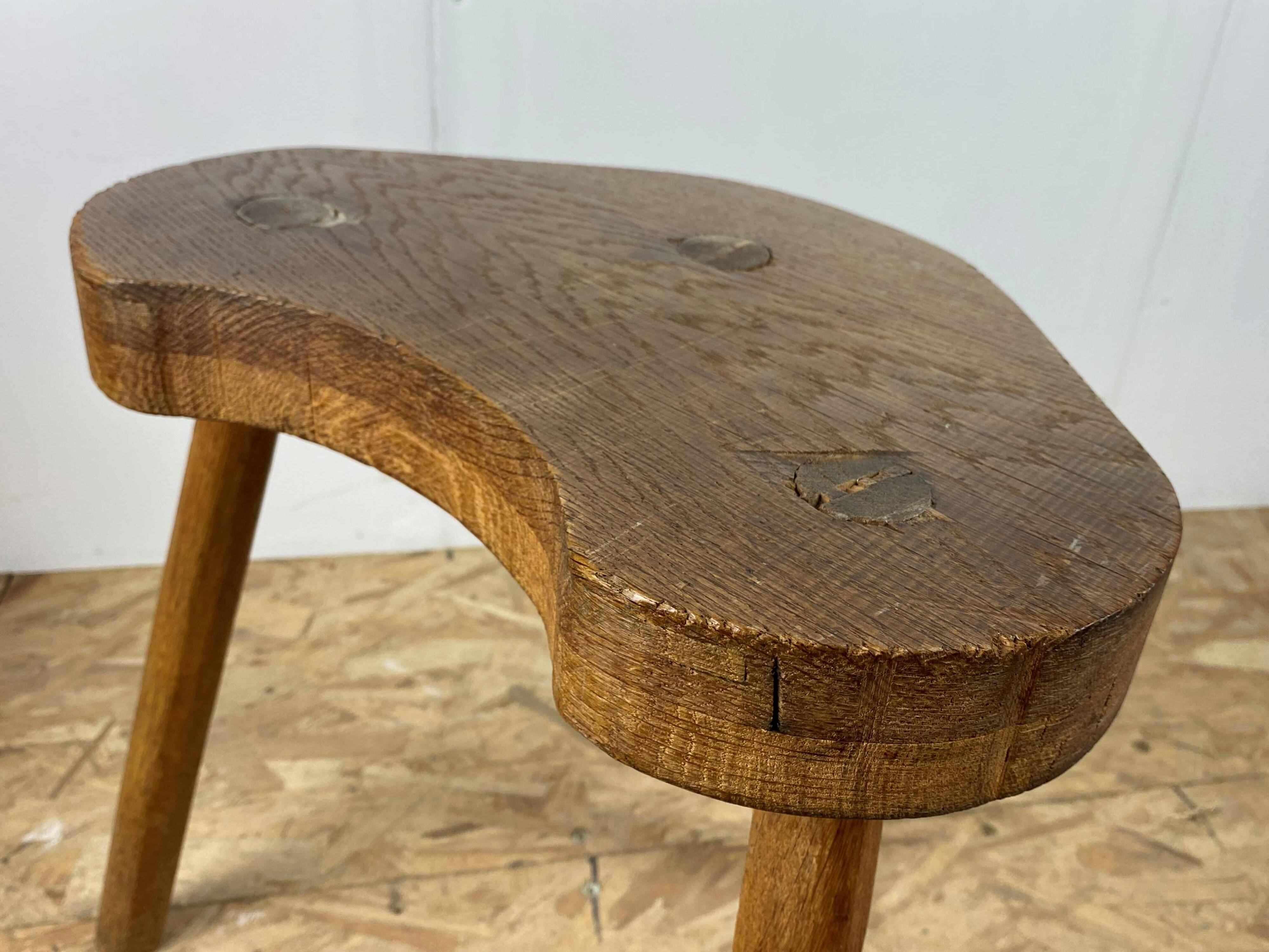 Set of 6 brutalist solid oak tripod farm stools from the 1950s