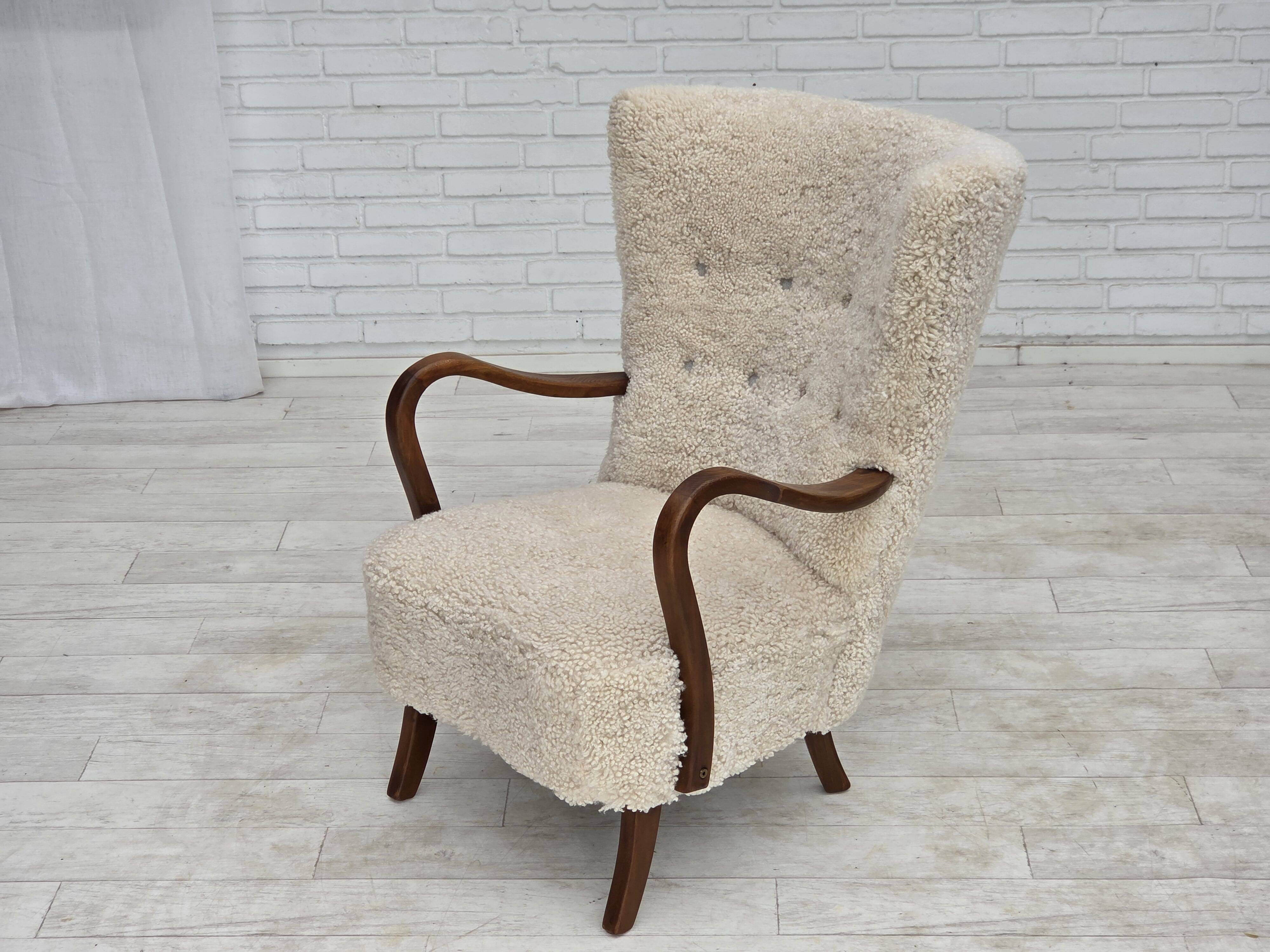 1960s, Danish design by Alfred Christensen, reupholstered, sheepskin.