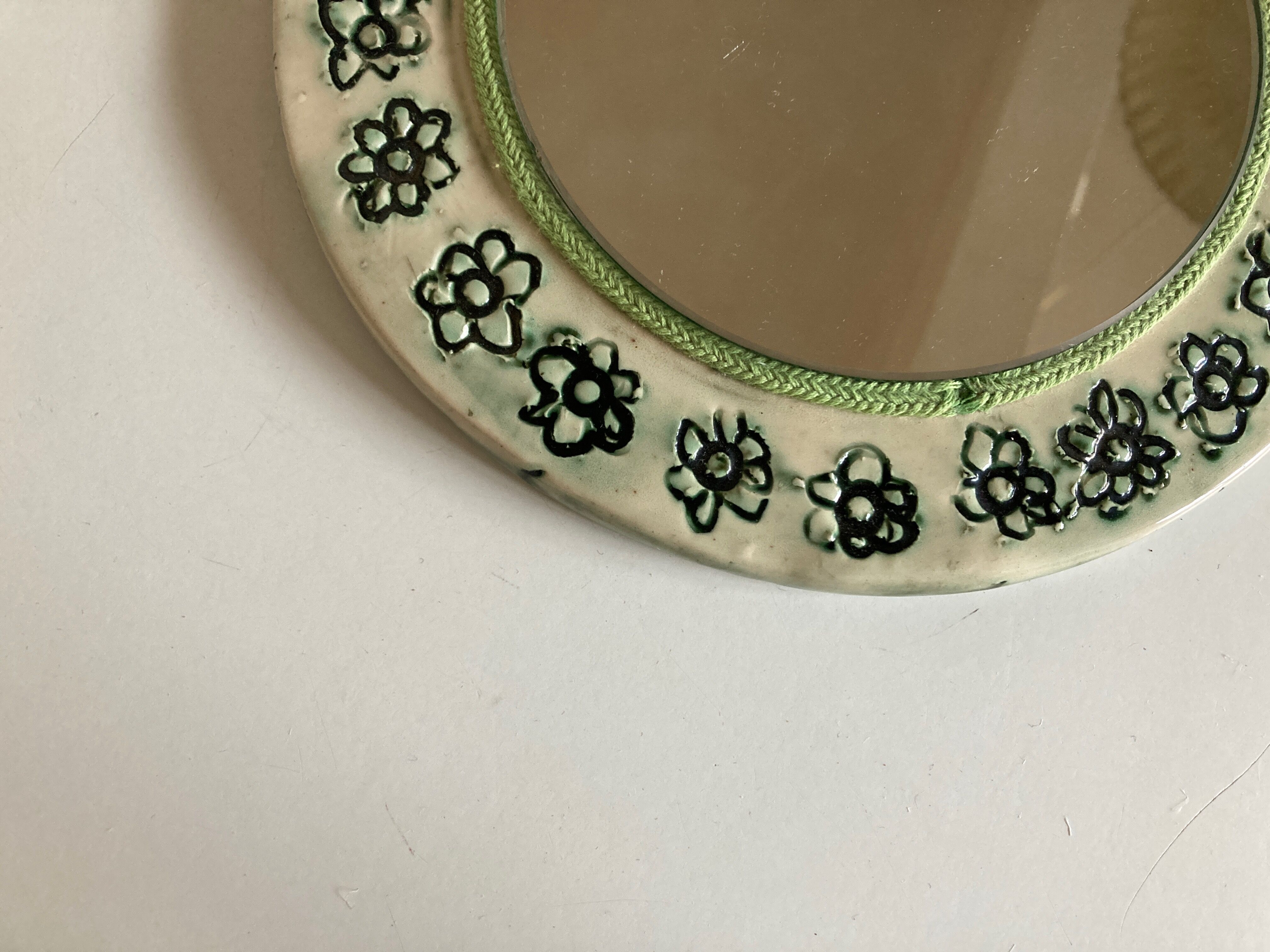 Incised ceramic mirror with flowers 1960