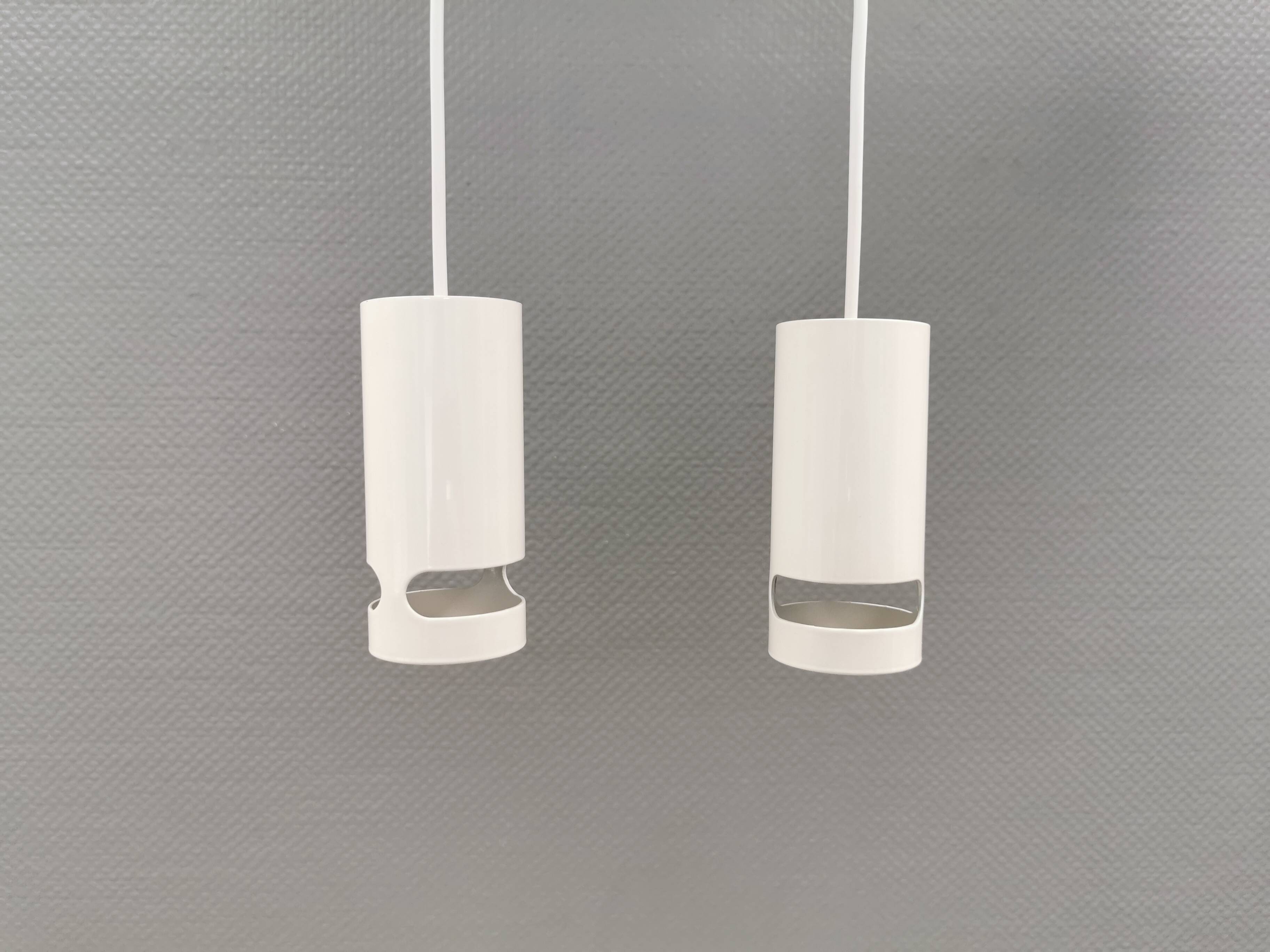 Two small cylindrical hanging lamps in white powder-coated 1980s