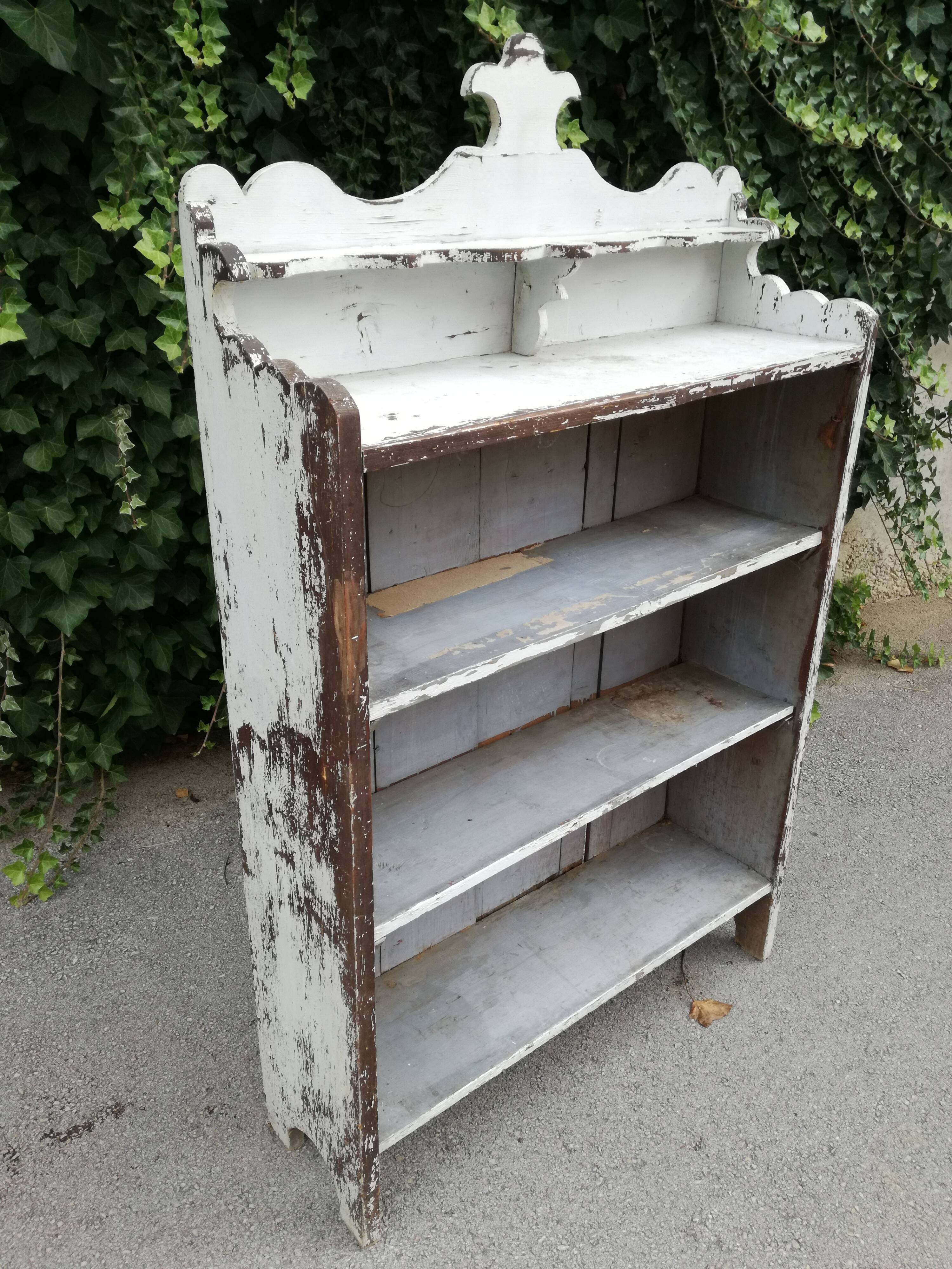 Old white shelf in weathered pine