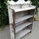 Old white shelf in weathered pine
