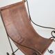 Paire de fauteuils en fer forgé et cuir vintage
