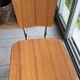 Duo de chaises en formica imitation bois marron et pieds eiffel