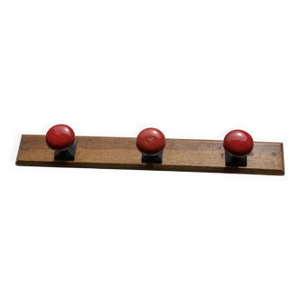 Wall-mounted coat rack with 3 hooks, vintage 1960s red lacquered metal.